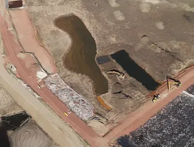 Nuodex Wetlands Pond - Environmental project in Woodbridge, NJ: 14-acre geomembrane-lined stormwater detention and wetland restoration.